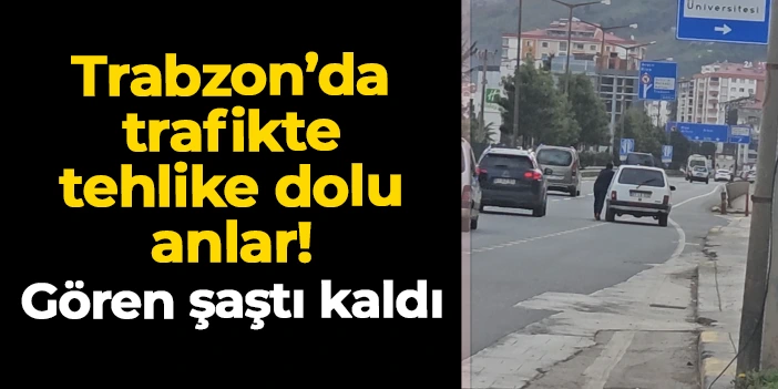 Trabzon Yomra'da trafikte tehlikeli anlar! Anayolda aracını iterek ilerledi