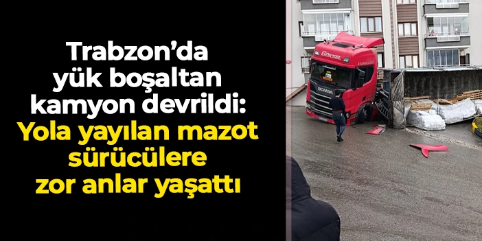 Trabzon’da yük boşaltan kamyon devrildi: Yola yayılan mazot sürücülere zor anlar yaşattı