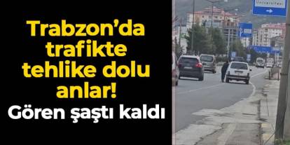 Trabzon Yomra'da trafikte tehlikeli anlar! Anayolda aracını iterek ilerledi